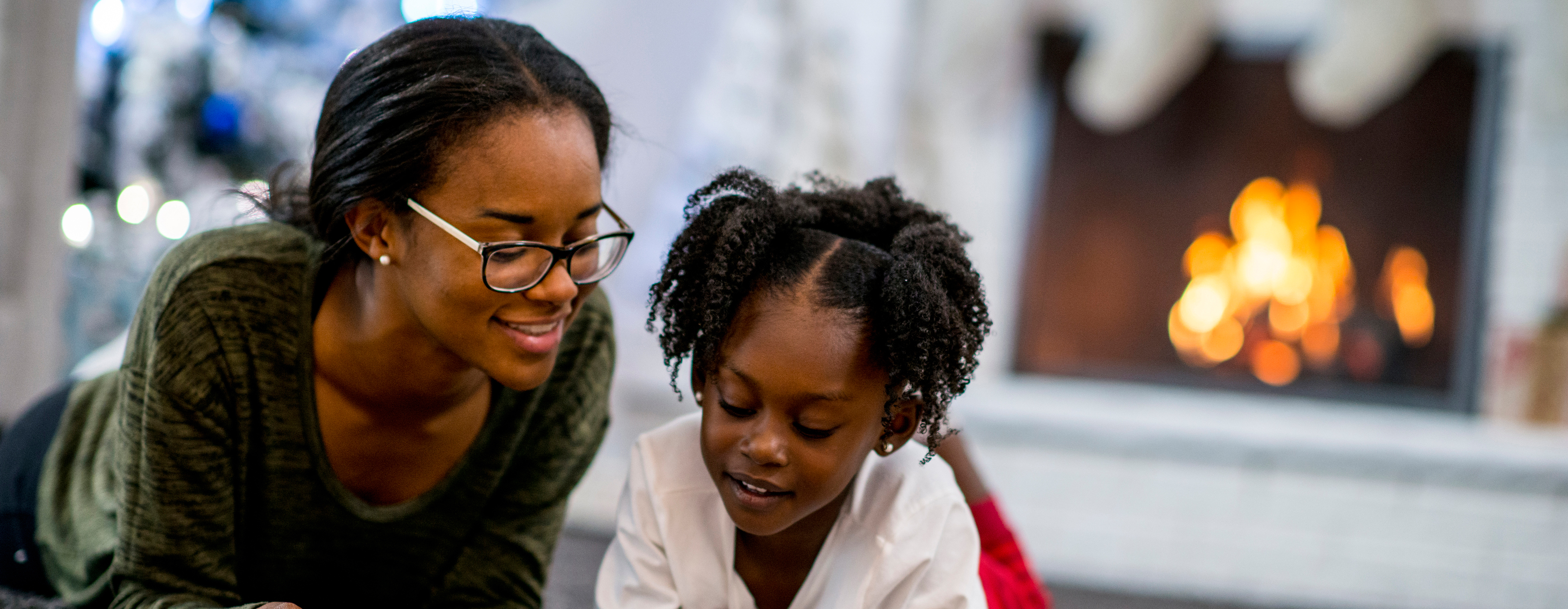 Child and Adult smiling